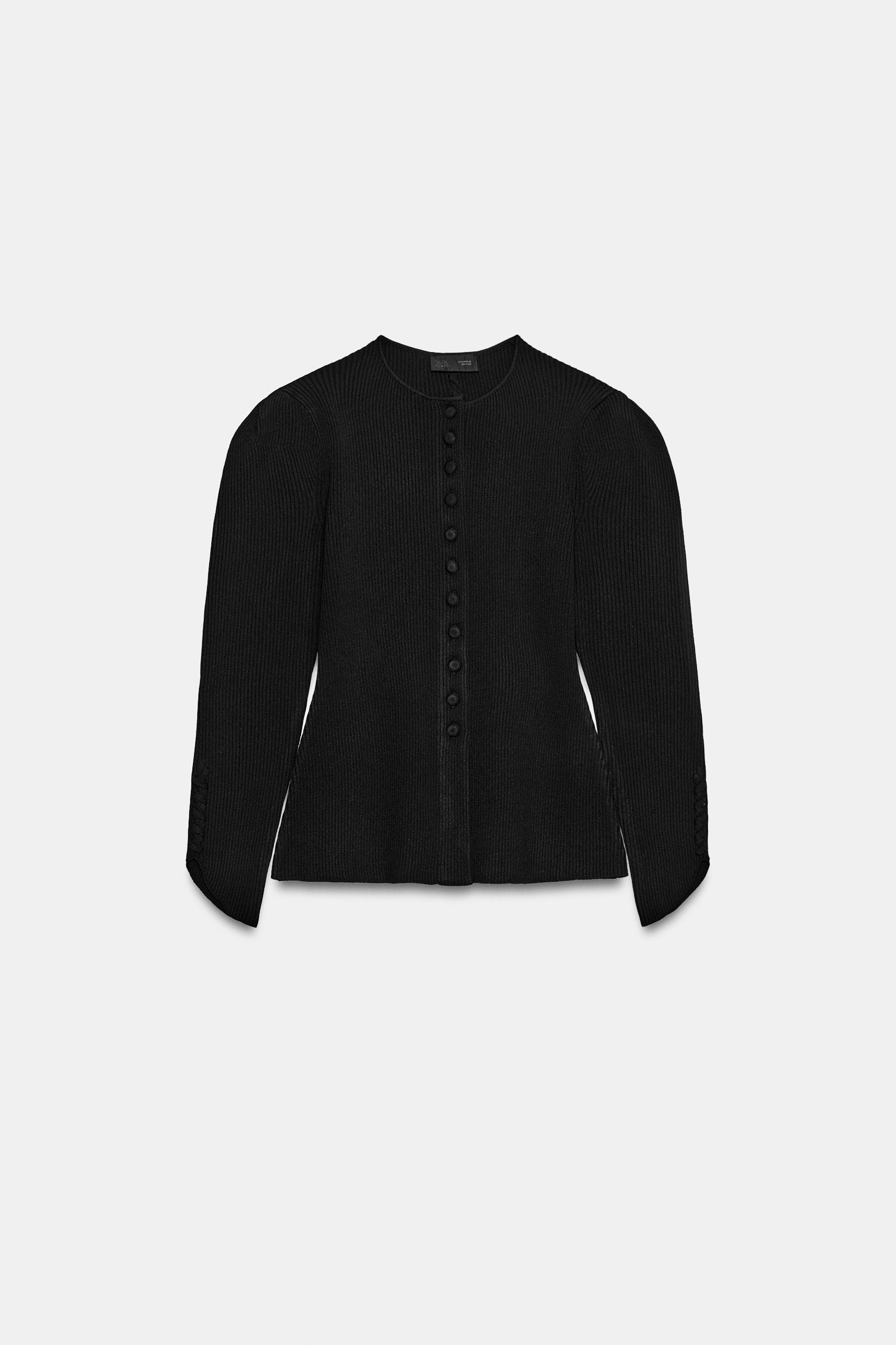 VESTE EN MAILLE À MANCHES BOUFFANTES